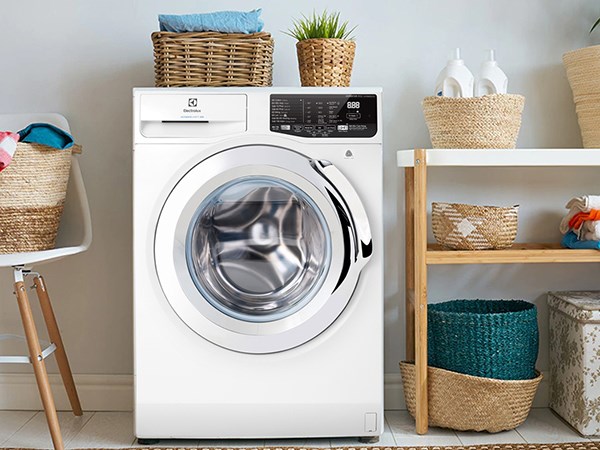 Ngủ mê thấy mình đang giặt quần áo bằng máy giặt